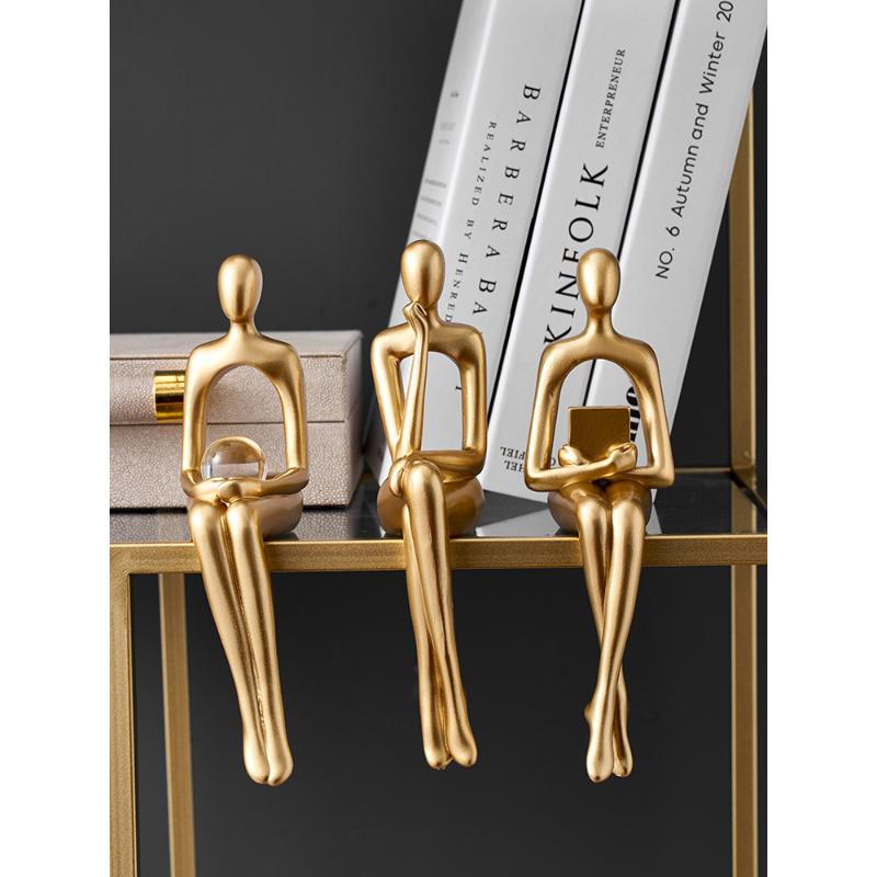 Heimdekoration, Bücherregal, Dekoration, Zubehör, abstrakte Harzstatue, goldene Miniaturen, modern