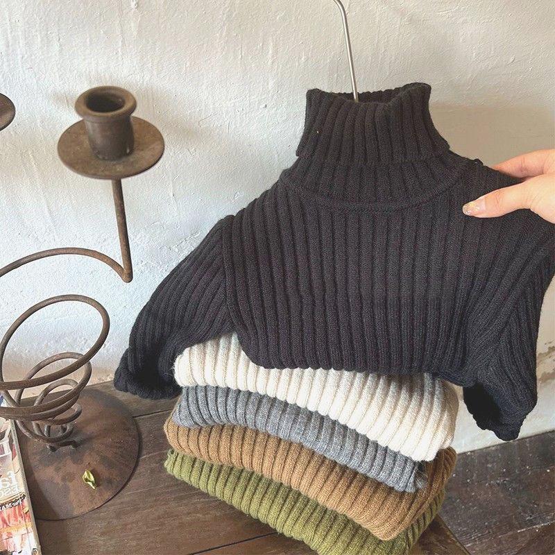 

Уютный детский свитер в рубчик: Мягкий трикотаж с высоким воротником для мальчиков и девочек - Коллекция Осень/Зима 2023 140 cm