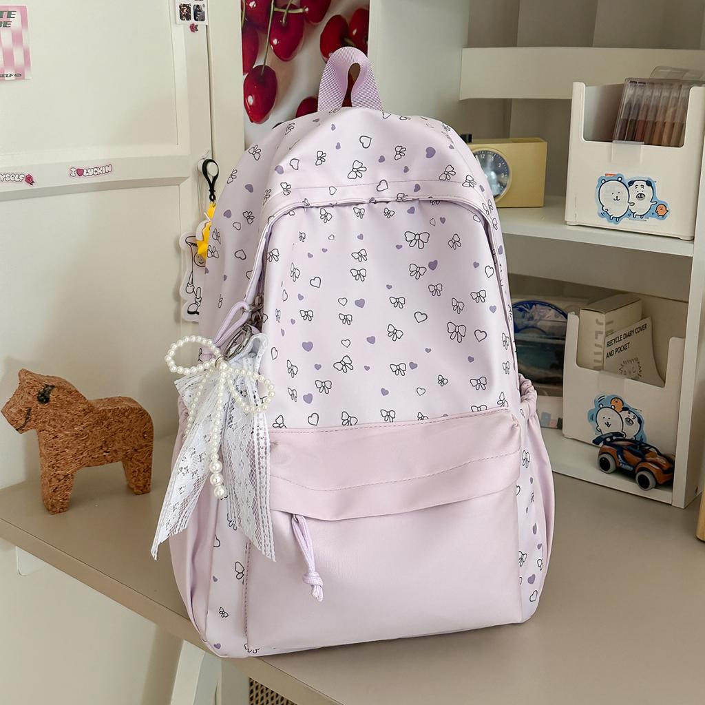 Schoolbag Junior high school bow high value niche 1011 new girl heart large capacity lightweight versatile backpack