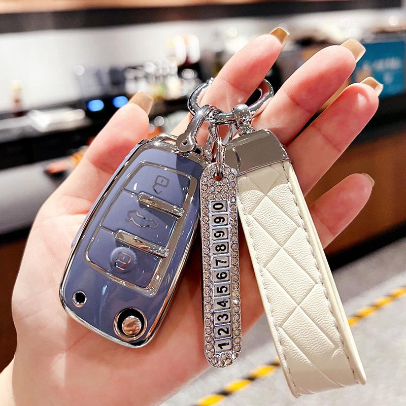 Chery Key Case for Tiggo 3x, Arrizo 5, and QQ Ice Cream - High-End Protective Shell with Buckle for Women.