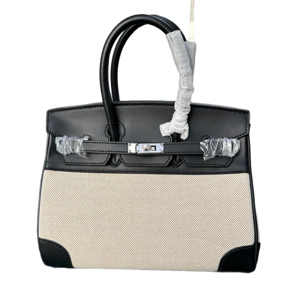 Grensoverschrijdende middeleeuwse 25cm30cm koeienhuid canvas damestas met lange schouderband forens casual leren schouder