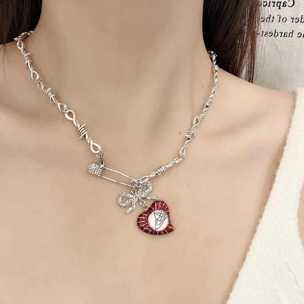 Queen Mother Saturn Pearl & Diamond Heart Necklace: Elegant High-End Sweet Cool Style with 3D Planet Design.