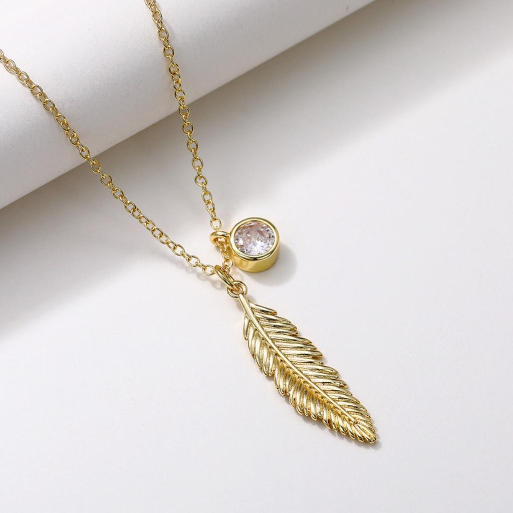 Vintage Feather Pendant Necklace with Sparkling Round Stone Accent Elegant Nature Inspired Jewelry for Women