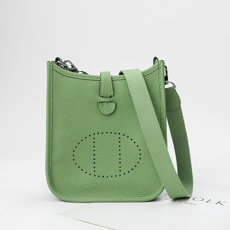 Factory wholesale first layer togo cowhide bucket bag women's bag lychee pattern hollow single shoulder crossbody bag hollow design