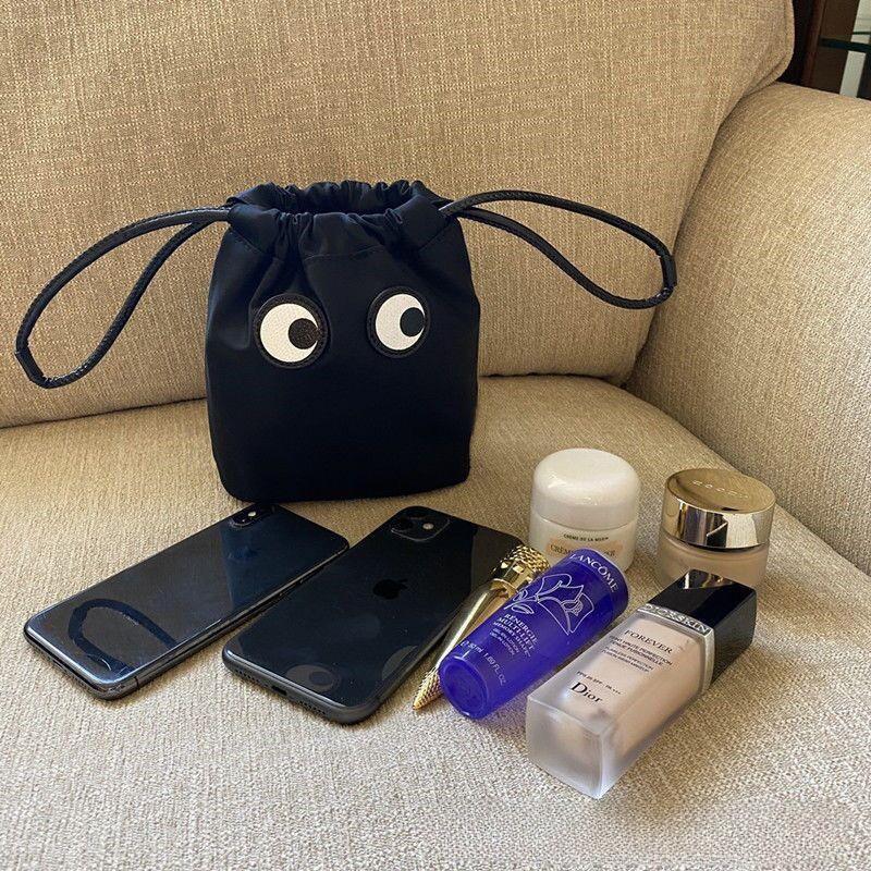 Cartoon Big Eyes Nylon Drawstring Handbag: Lightweight & Fashionable Mini Storage Bag