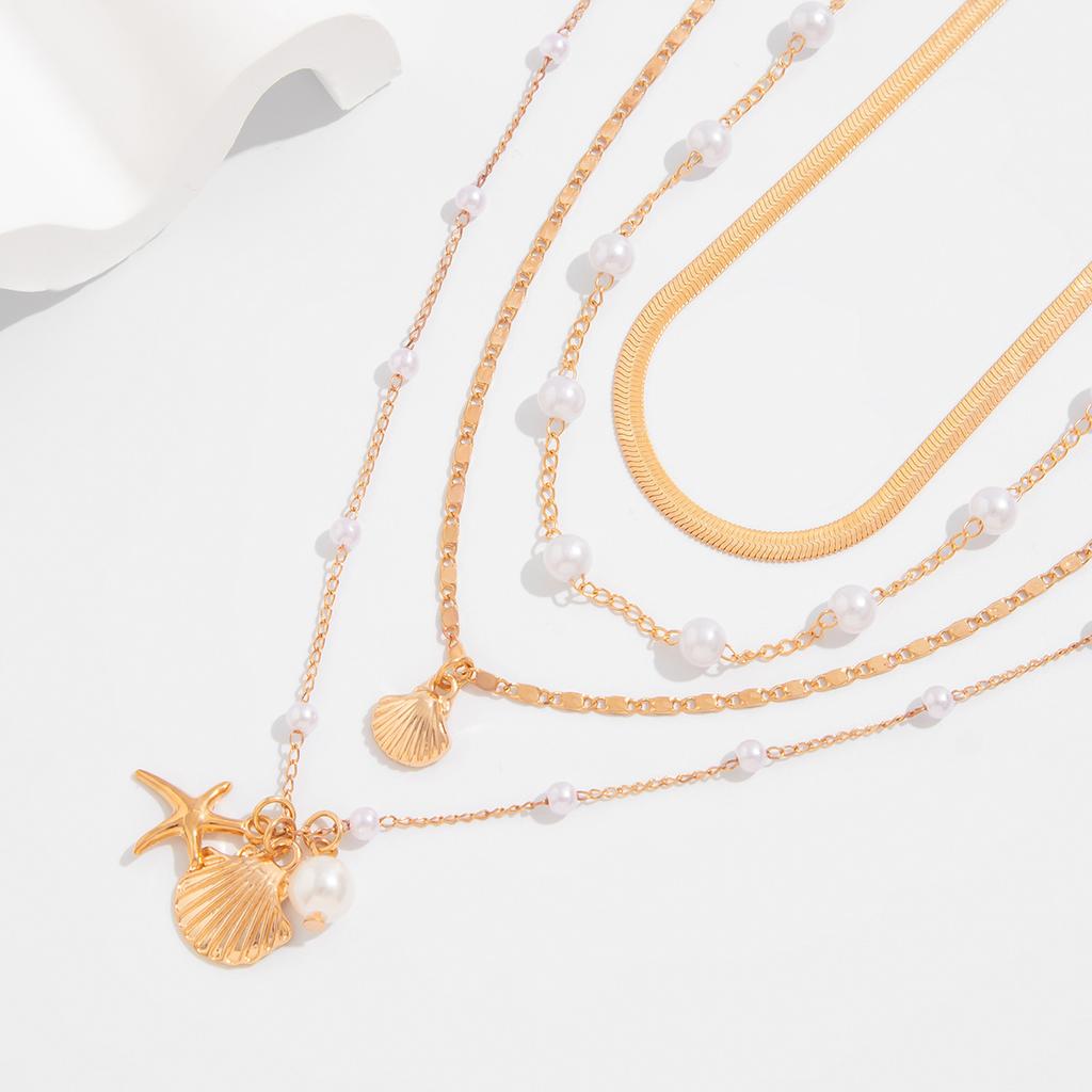 European and American ocean style metal scallop shell starfish pendant necklace ins imitation pearl snake bone chain necklace for women