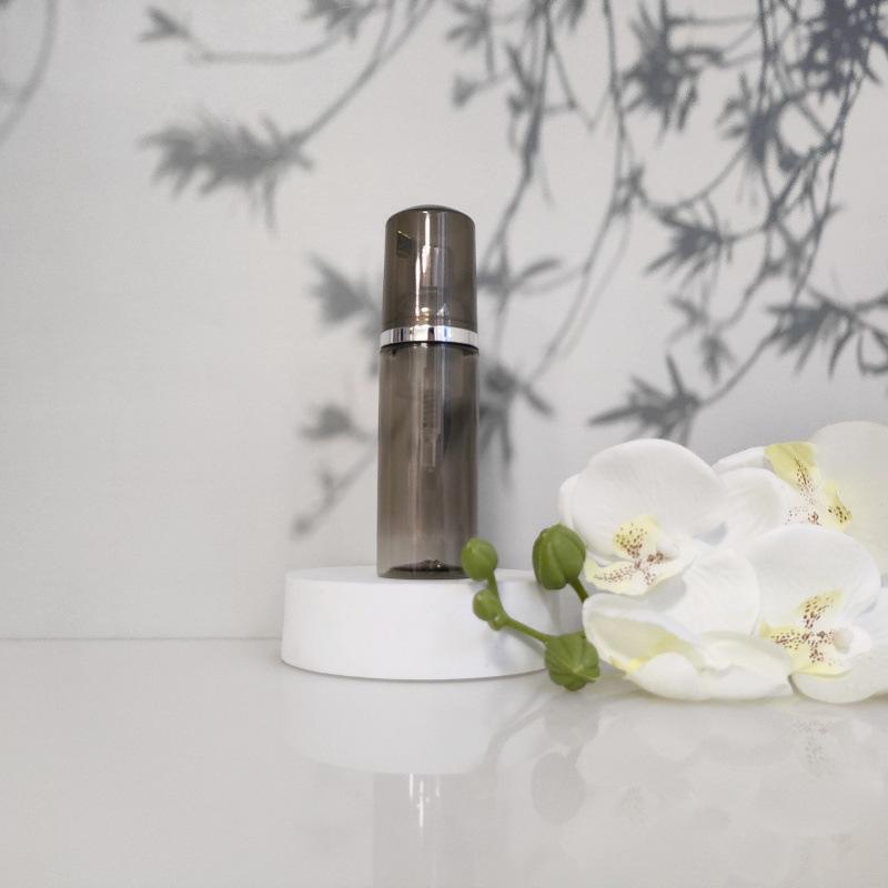 Available 60ml Transparent Black Foam Mousse Bottle for Face Wash and Travel-friendly Cosmetic Packaging.