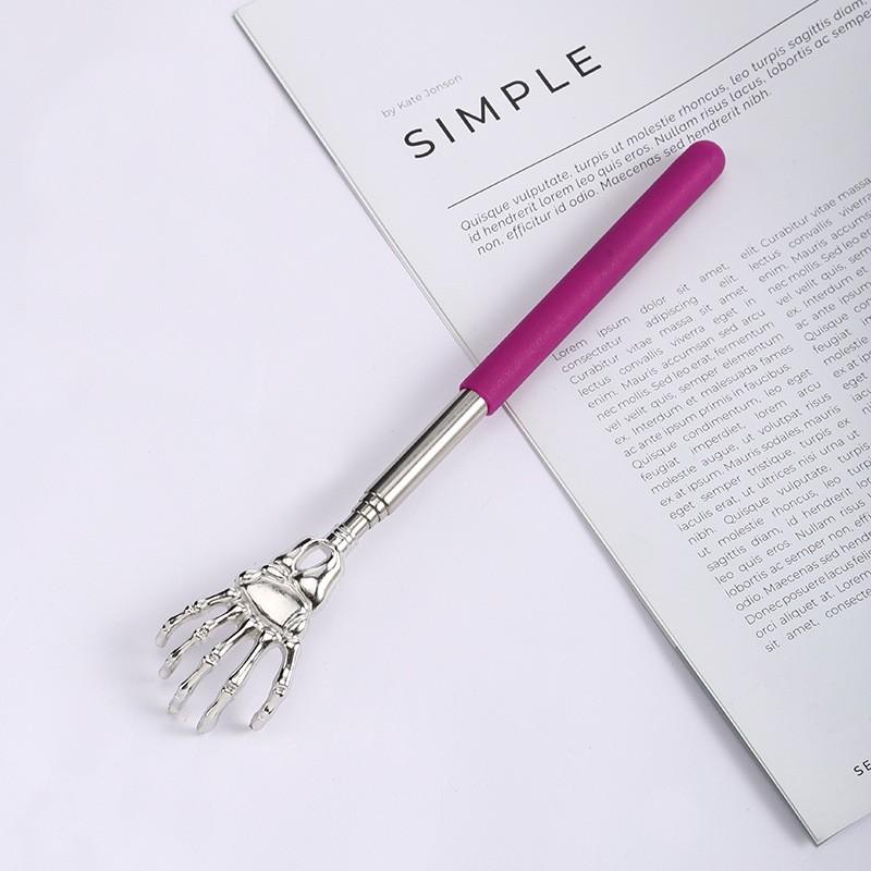 Zatahovací nerezový domácí masážní přístroj, škrábátko, lechtátko