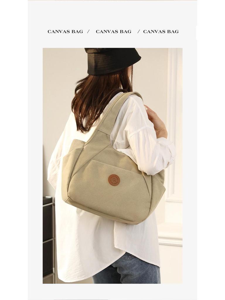 2025 Women's One-Shoulder Bag: Trendy, Versatile Canvas Handbag with Large Capacity, Simple Korean Style, Solid Color.
