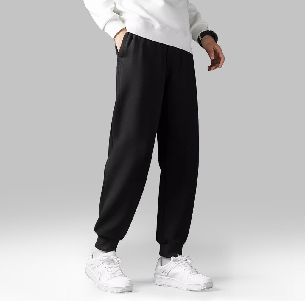 Li Ning Sports Lifestyle Series Loose Fit Drawstring Mid Waist Cuffed Knit Joggers Men Joggers Standard-Black AKLU157-1