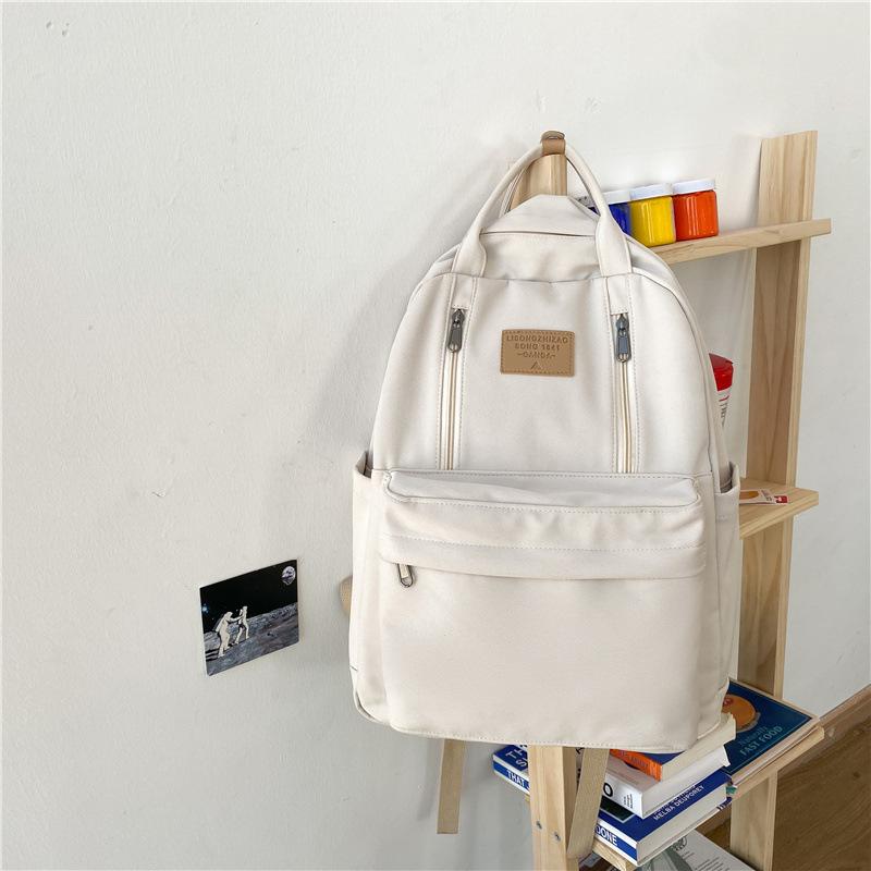 Schoolbag1011 new Japanese middle and high school student schoolbag women's large-capacity backpack simple outdoor commuter computer backpack