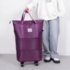 Unisex Expandable Large-Capacity Travel Duffel Bag with Wheels, Foldable Boarding Luggage for Business Trips and Shopping.