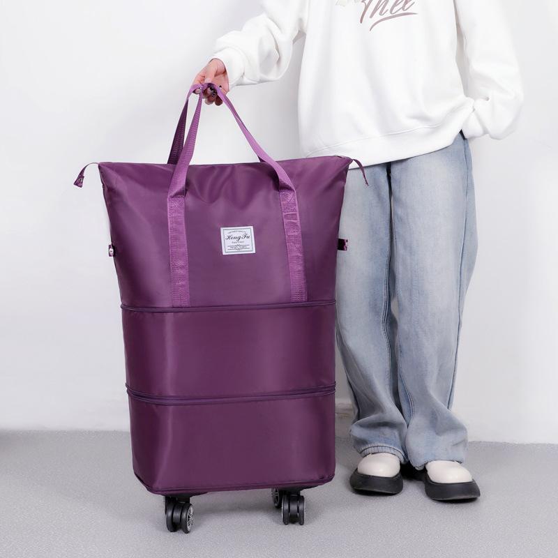 Unisex Expandable Large-Capacity Travel Duffel Bag with Wheels, Foldable Boarding Luggage for Business Trips and Shopping.