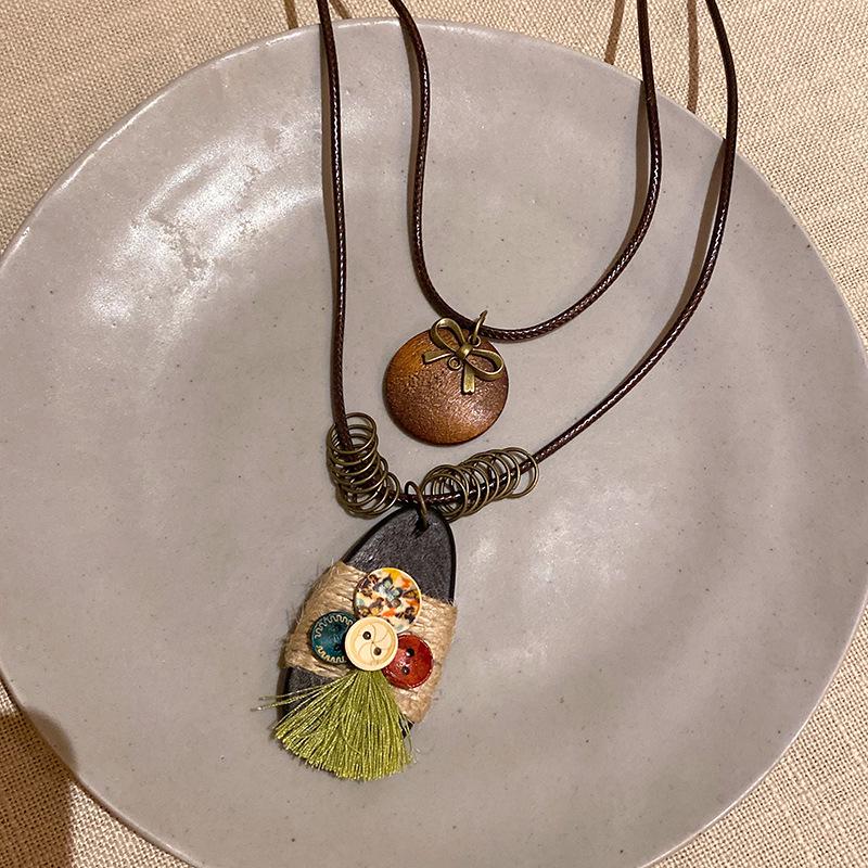 Retro Chinese Tassel Necklace: Unique Ethnic Style Women's High-End Clavicle Chain.
