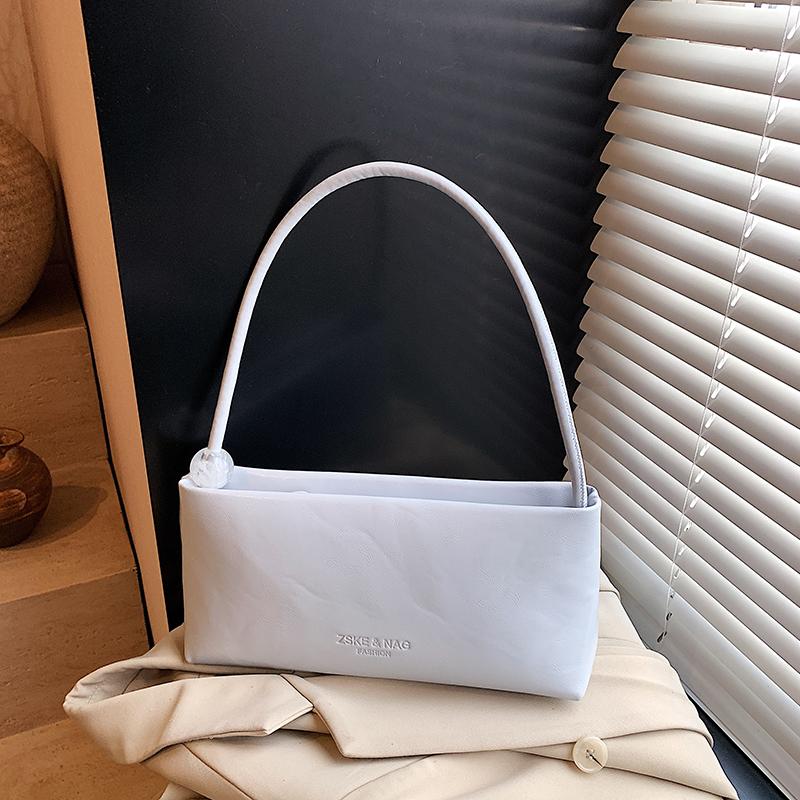 New Women's Red One Shoulder Bag Summer Large Capacity Solid Color Underarm Bags Trend Textured Commuting PU Handbags