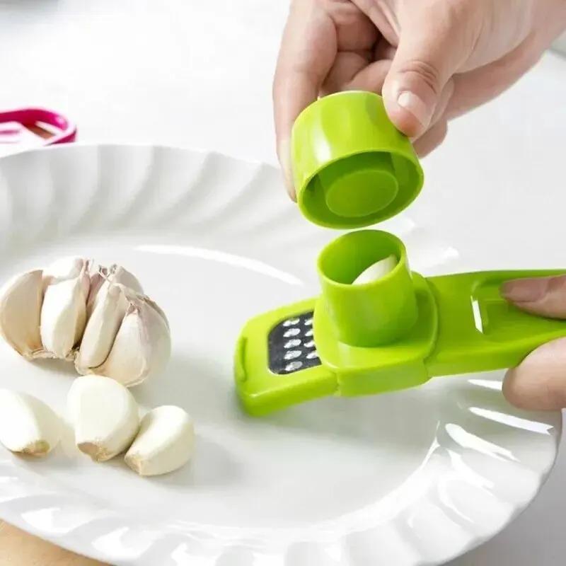 1 balení Mini mlýnek na česnek Creative Lis na česnek Kuchyňská česneková kaše Ruční šťouchání česneku Zelené kuchyňské pomůcky