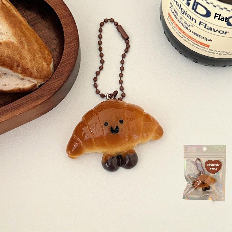 

Adorable Resin Bread Bagel Keychain Cute Cartoon Simulation Alkaline Water Bread Pendant Bag Hanging Decoration Gift