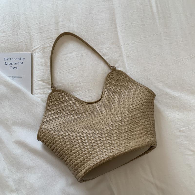 Niche woven bucket bag women's autumn large-capacity casual high-value commuting shoulder armpit bag