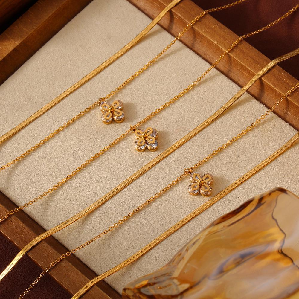 Gold-Plated Titanium Steel Necklace with Rhinestone-Inlaid Floral Pendant