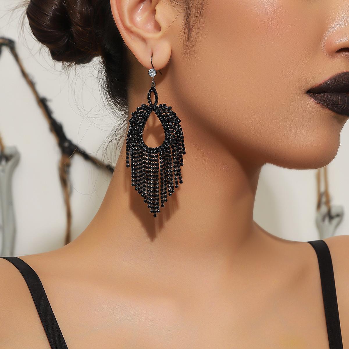 

Нові розкішні чорні сережки з довгою бахромою