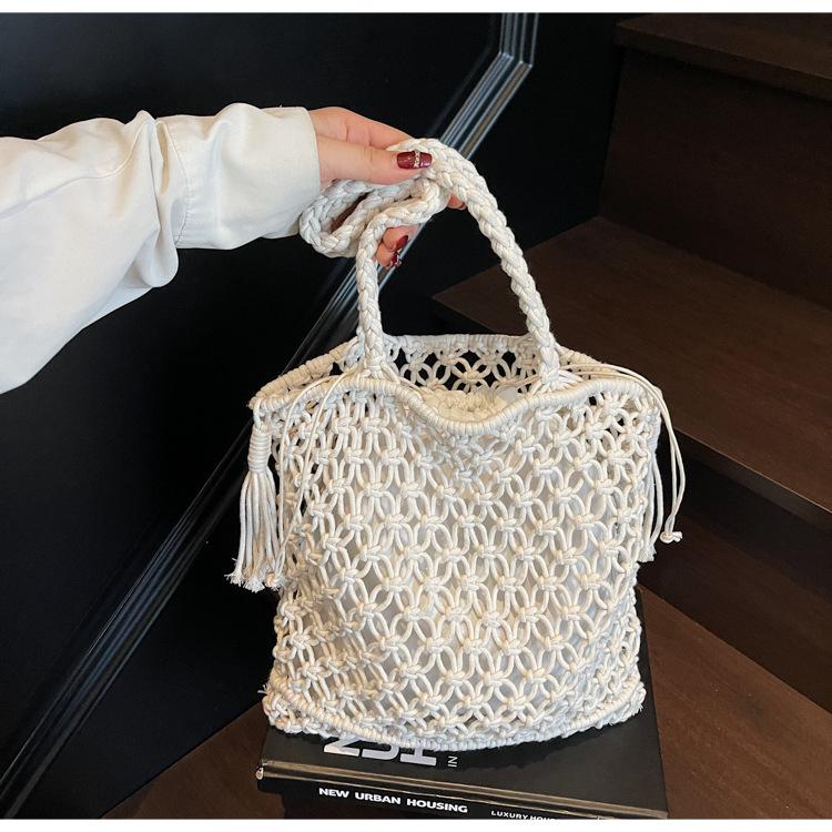 New Retro Hand-woven Bag Tassel Tote Fishing Net Pocket Summer Vacation Beach Hollow Women's Bag