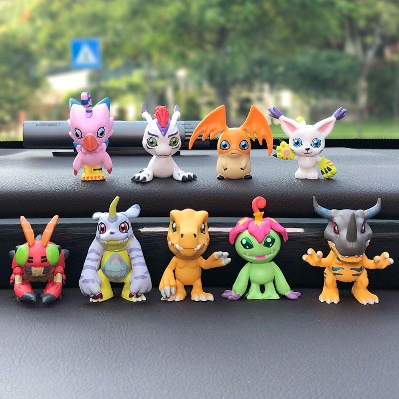 9-piece set of cute Japanese Digimon Adventure anime figures, including Agumon, Patamon, and Gabumon. PVC tabletop figurines.