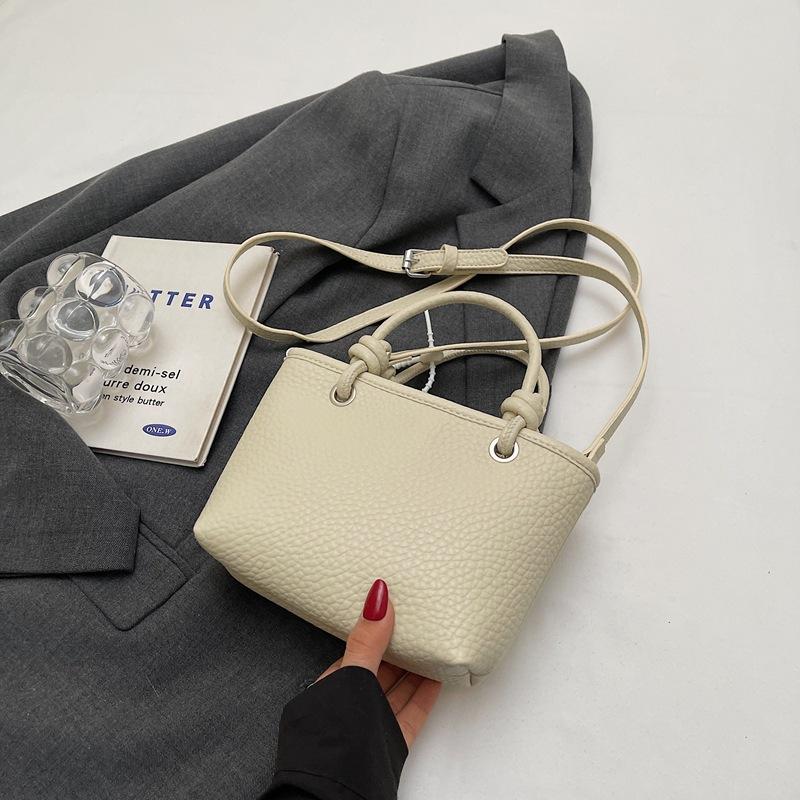 Fashion high-end hand bucket bag spring and summer simple and versatile shoulder bag trendy niche messenger bag