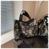 Embroidered canvas bag women's large-capacity new summer versatile messenger bag college student commuter tote bag