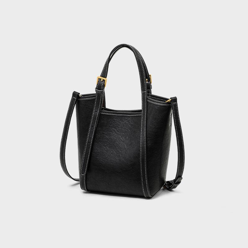 2025 New Black Leather Bucket Bag Autumn Winter Handheld Basket Commuter Crossbody Bag Niche High-End Women's Bag