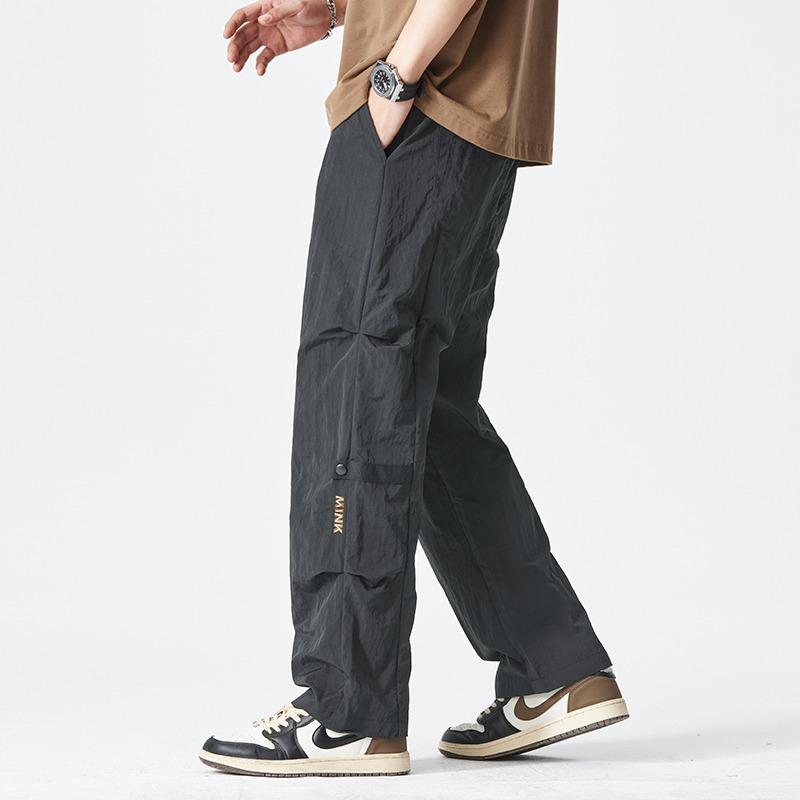 

Mountaineering pants men s summer thin quick-drying wide-leg parachute soldier pants loose straight trousers 4XL чёрный