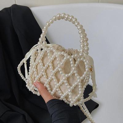 French Retro Handbag Fairy Woven Beaded Bucket Bag Crossbody Bag Summer Niche Design Hollowed Out Pearl Bag MIT