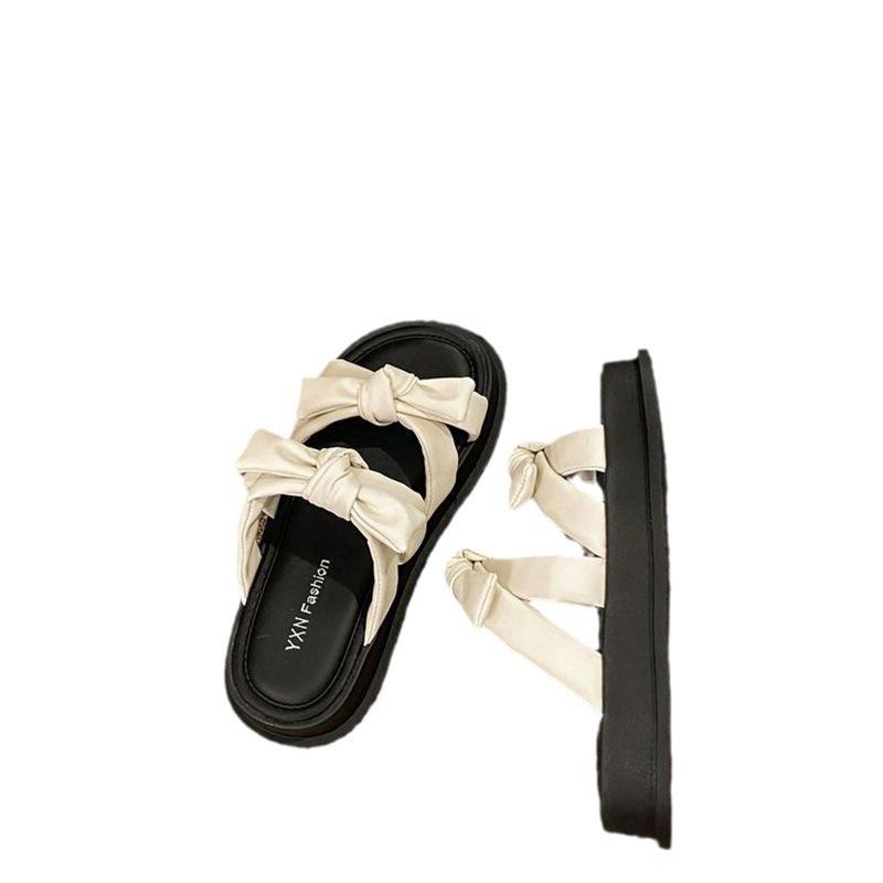 2024 summer new Internet celebrity explosion thick bottom heightening slippers women's outer wear skirt beach non-slip heightening cool slippers