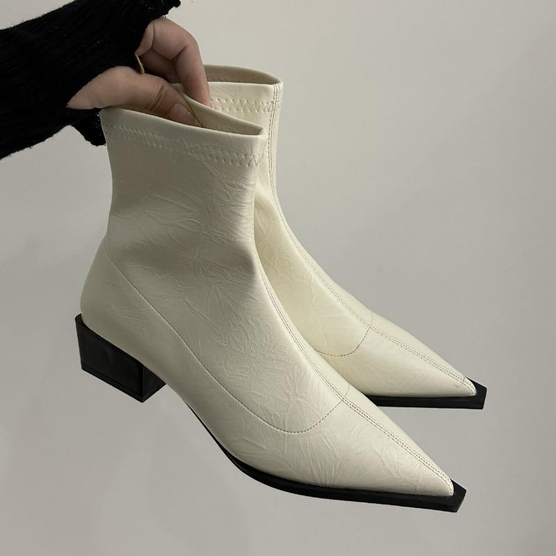 

Pointed short boots women s new autumn and winter women s boots thick heel boots sleeve thin boots niche high heels Martin boots 35