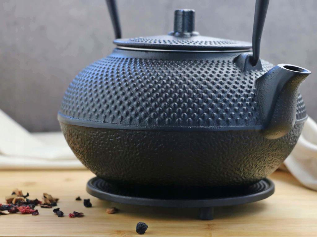 Cast Iron Protective Stand For A Hot Kettle Pot
