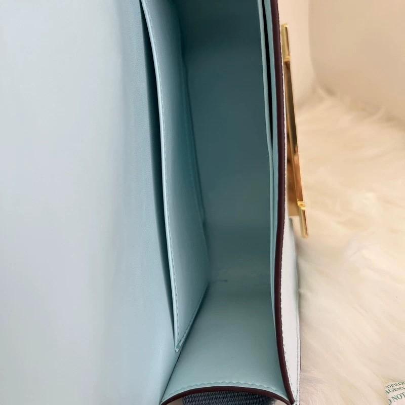 2025 New Leather Women's Bag Goat Pattern Leather Men's and Women's Same Clogs Wide Shoulder Strap Epoxy Leather Color Buckle Cross-border Wholesale