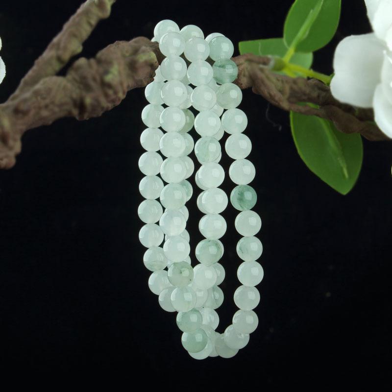 Women's Natural Tianshan Green Jade Bracelet with Round Beads and Floating Flower Design