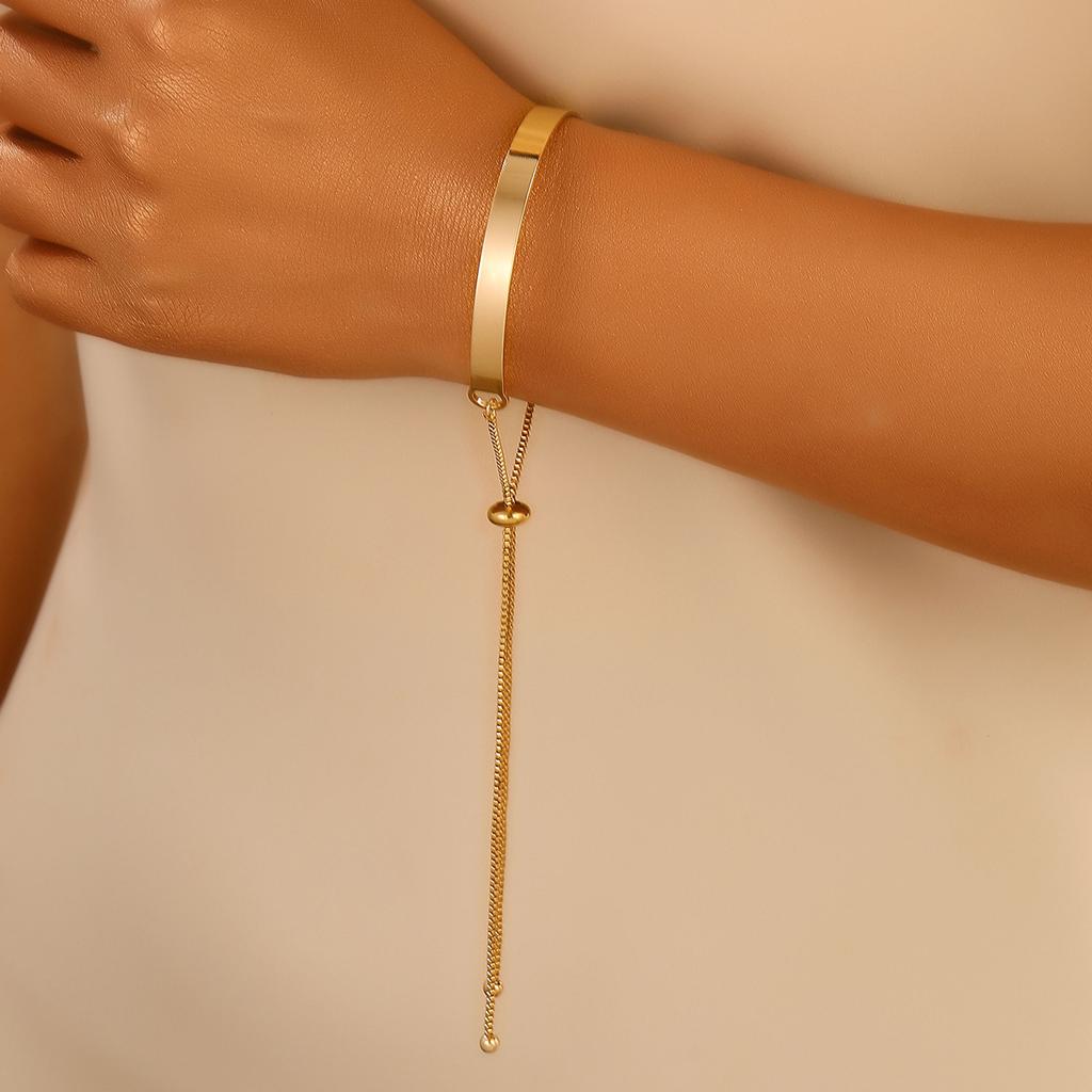 High-quality 2026 gold double-layer S-shaped hollow-out modeling bracelet, simple and versatile snake-shaped opening adjustable jewelry.