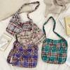 New tie-dye plaid one-shoulder messenger bag, flip zipper canvas bag, large-capacity commuter underarm bag.