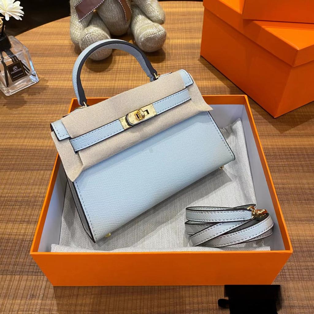 Grenzüberschreitende Hersteller Großhandel Damenhandtaschen 2023 neue Handtaschen aus Leder mit Palmenmuster tragbare Schulter-Umhängetaschen Damenhandtaschen große Kapazität