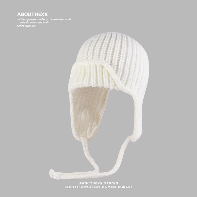 

Розовая вязаная шерстяная шапка для осени и зимы, женская шапка-ушанка на шнуровке, теплая и универсальная, подчеркивающая лицо, маленькая лыжная шапка Лей Фэна M（56-58cm）