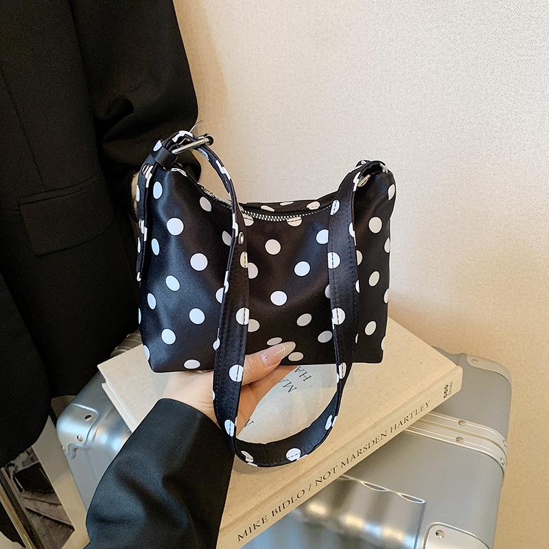 Niche polka dot pillow cloth bag women's new versatile shoulder underarm bag work small bag