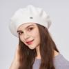 A Women's Beret Knitted Woolen Hat with Autumn and Winter Thick Ear Protection Wool Hat and Shiny Diamond Decoration