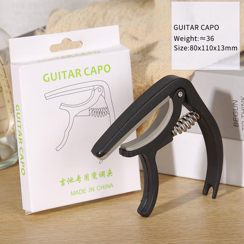 Guitar Nylon Capo & Transposer: Key and String Adjuster for Ukulele & Folk Guitar