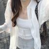 Chemise de protection solaire blanche veste pour femme printemps et été nouvelle chemise niche ample et fine tempérament top fin