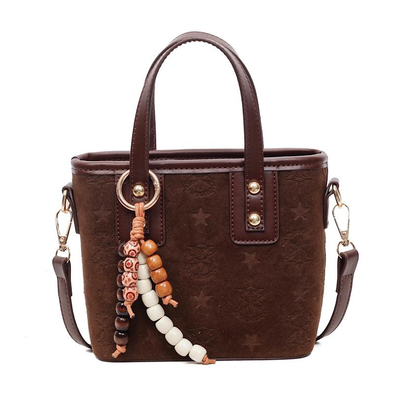 

Popular retro portable bucket bag women s 2025 autumn and winter new fashion versatile shoulder bag simple messenger bag no pendant темно-коричневого