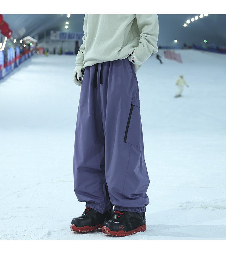 Unisex Waterproof & Windproof Ski Pants for Extreme Cold, Ideal for Northeast China Winters, Mountaineering, and Snowboarding.
