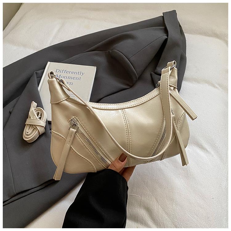 

Korean niche croissant women s bag new high-end casual simple messenger bag daily commuter shoulder bag