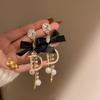 Black retro flower butterfly earrings temperament high-end stud earrings fashion niche versatile light luxury earrings