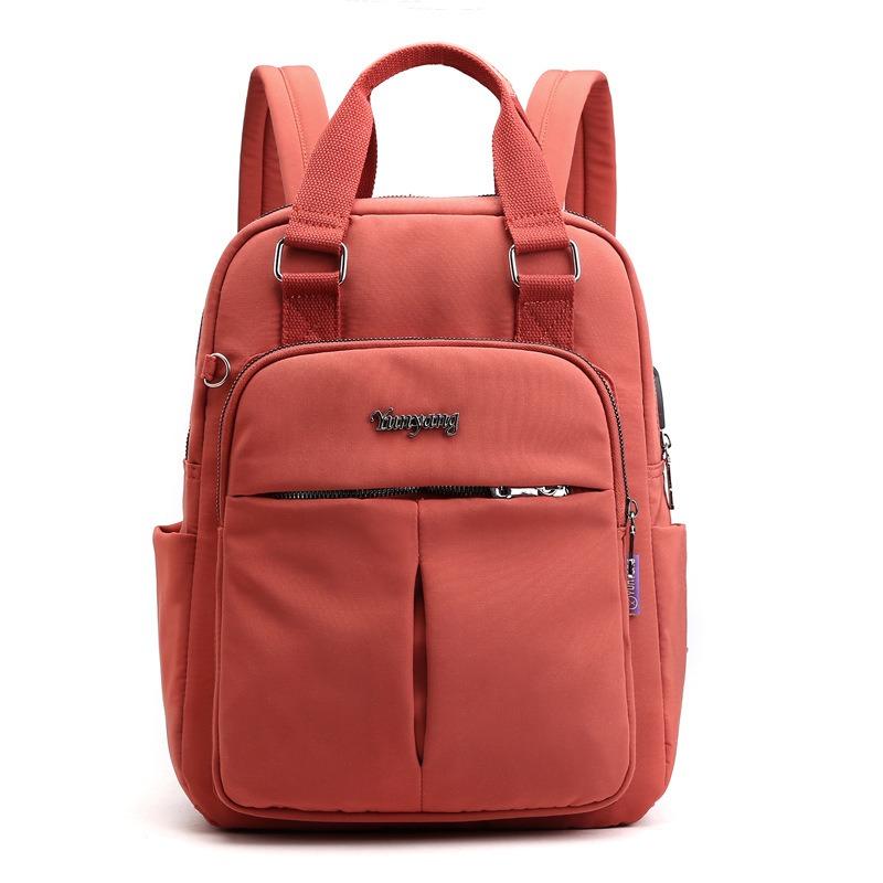 

New casual backpack women s charging backpack computer bag large capacity college wind travel backpack помаранчевий