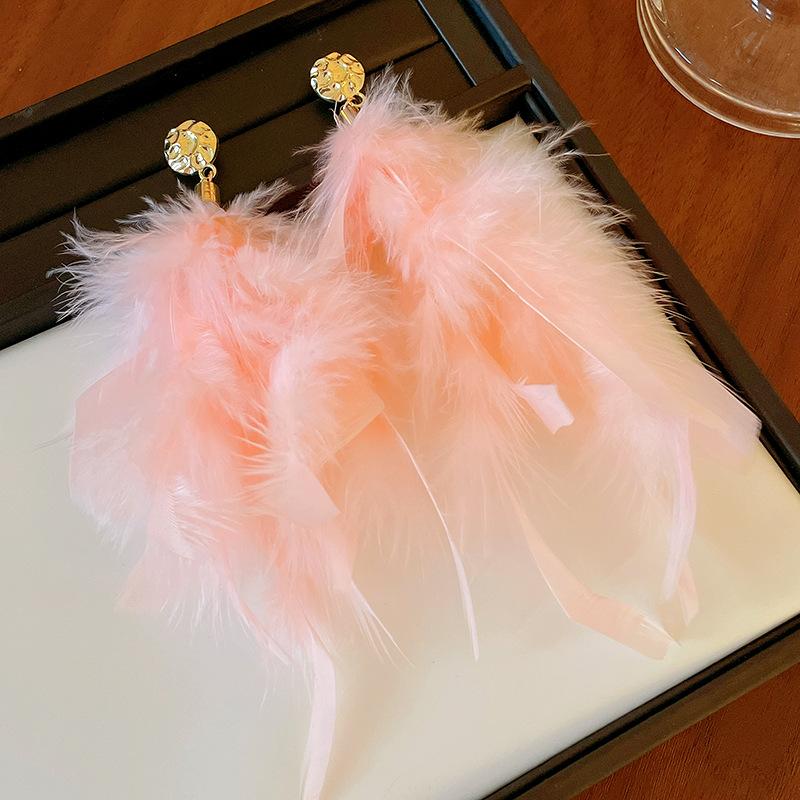 Silver needle super fairy artificial pearl feather earrings Bohemian retro exaggerated earrings niche new exquisite earrings